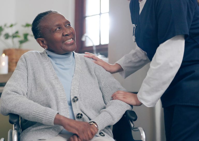 Caregiver Resident Compassionate respite care environment at Lakeshore Woods Assisted Living