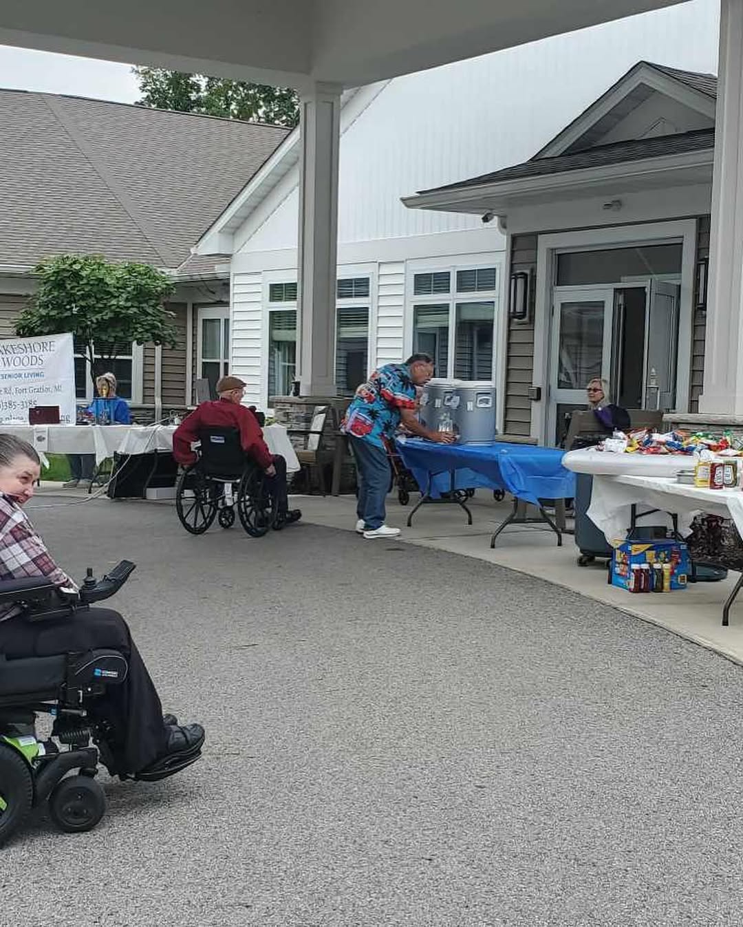 Residents participating in creative activities with caregivers — compassionate hospice care at Lakeshore Woods in Michigan.